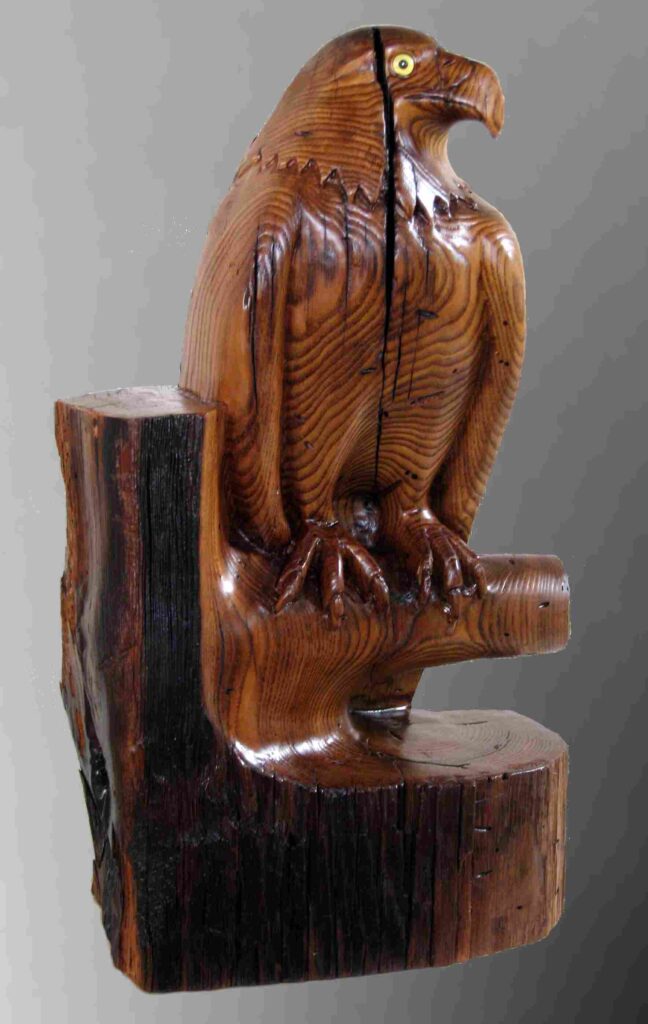 stylized american chestnut wood beam carving of an eagle by gary carver of carverscarvings