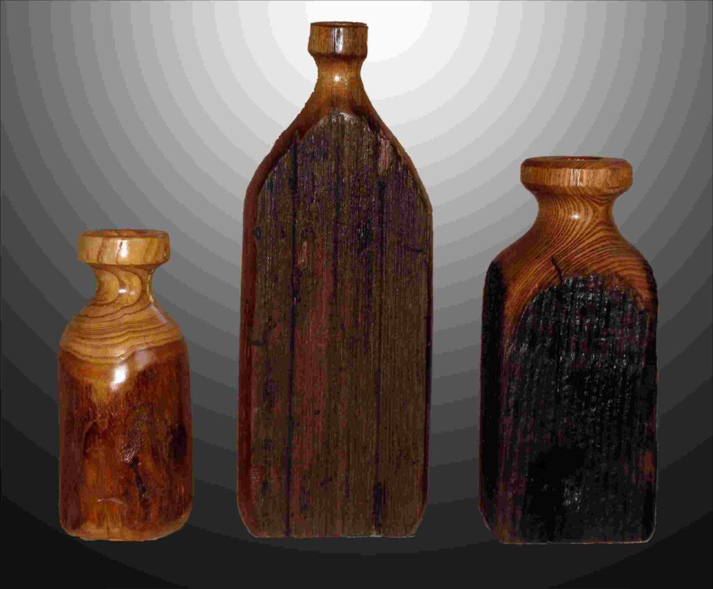 wood carvings of three dry vases by gary carver of carverscarvings